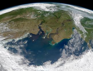 Earth from cupola_NASA image. Courtesy Norman Kuring, Ocean Color Web