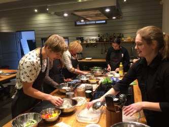 Members of the City Lab Tartu hosted by Science Centre AHHAA preparing lunch as part of Lab activities