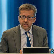 EU Research Commissioner speaking at the European Open Science Cloud Summit. Credit: Science|Business