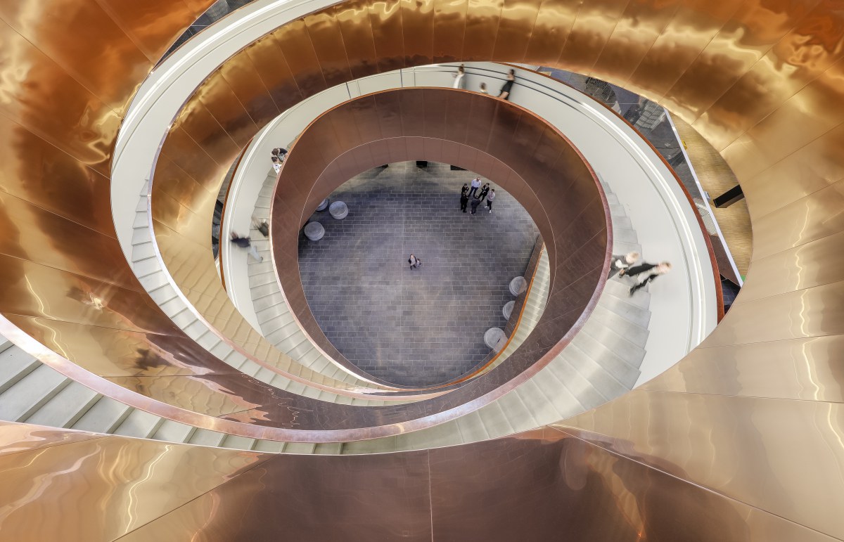 "A giant copper spiral staircase, designed to look like DNA, sets the tone for this science museum" - TIME