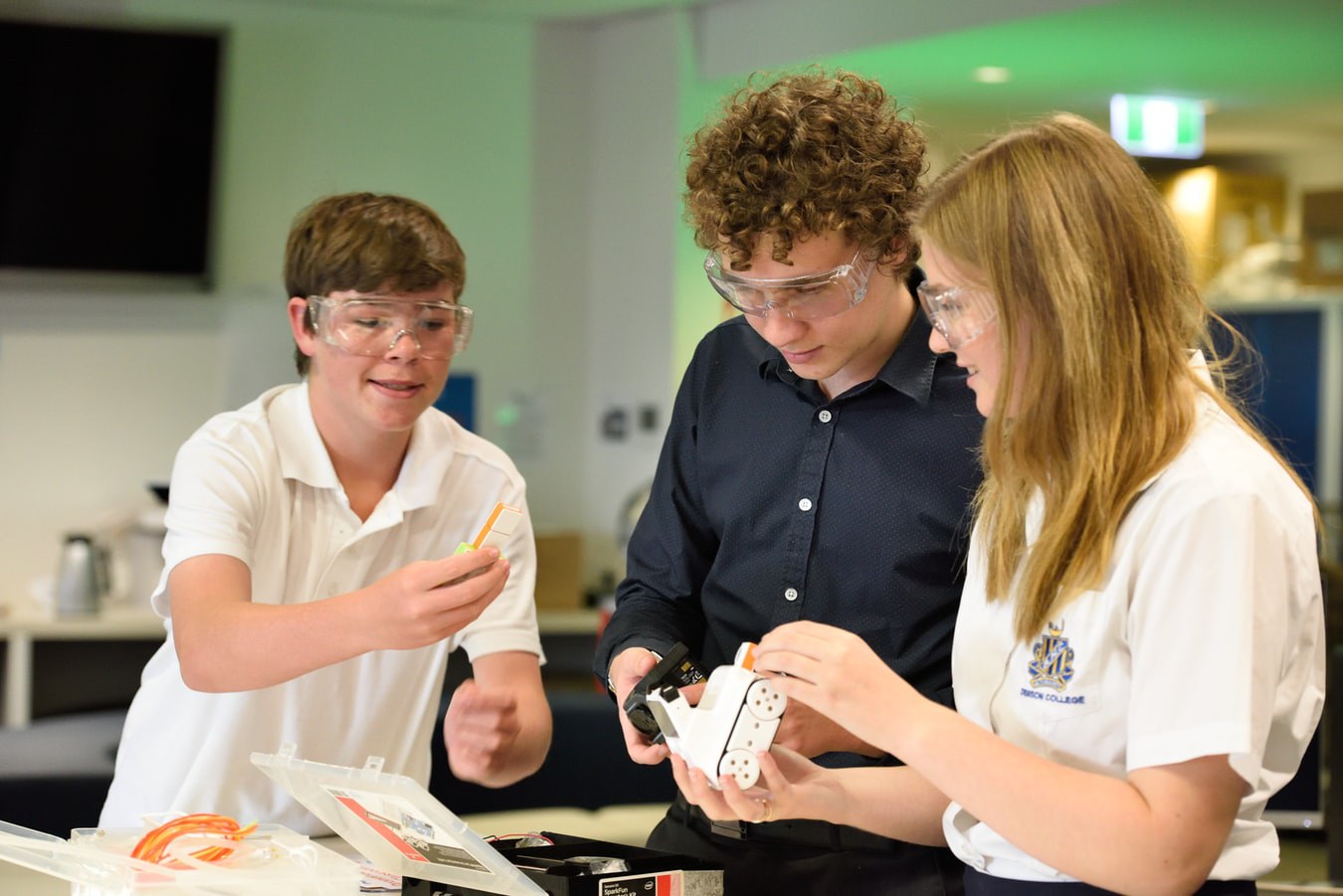 Teenagers attending a technology workshop