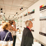 PLACES participant reading Local Action Plan (LAP) posters, Turin, 2013