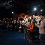 Visitors listening to the integrated audio tour