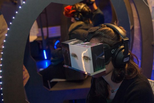 Visitor at the Climat VR exhibition at La Casemate, Grenoble, France, December 2015. Photo Pierre Jayet 